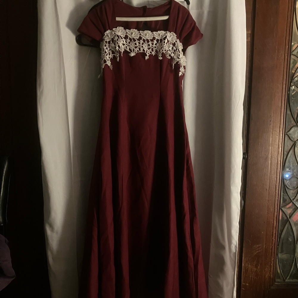Elegant Burgundy Dress with Lace Detail and Bow Closure in Back